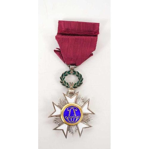 4 - A Begian Order of the Crown Knights Cross medal.