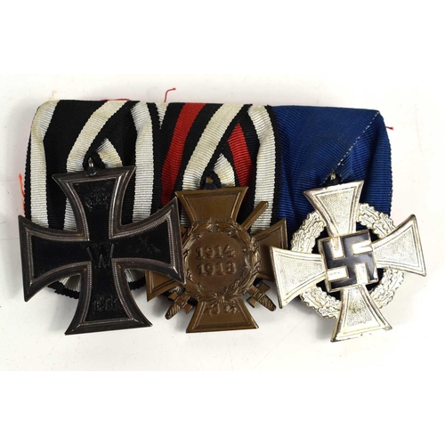 42 - A WWI German medal group comprising of the Imperial Iron Cross, Honour Cross medal and the Civil Ser... 