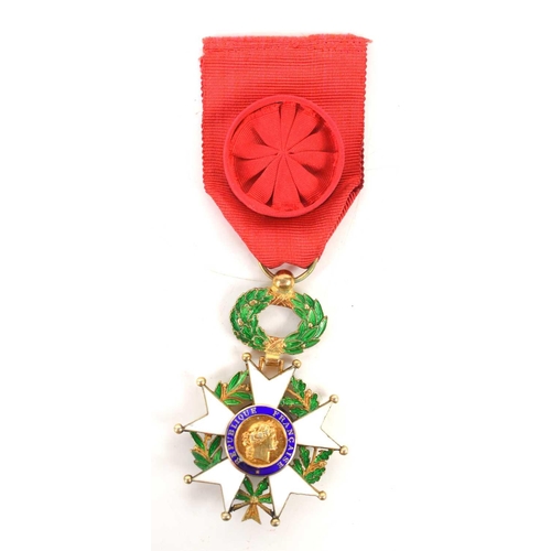 44 - An 1870-1951 French Legion d'Honneur medal, mounted on red ribbon with rosette.