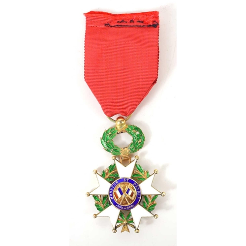 44 - An 1870-1951 French Legion d'Honneur medal, mounted on red ribbon with rosette.