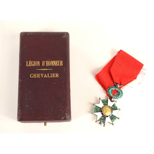 46 - A French Legion of Honour medal with its wreath suspension, in its hardshelled case of issue, the ca... 