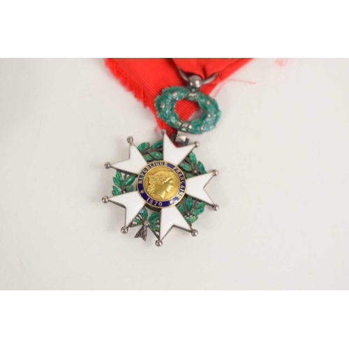 46 - A French Legion of Honour medal with its wreath suspension, in its hardshelled case of issue, the ca... 