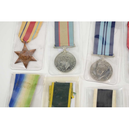 47 - A collection of WWII and later medals to include an Imperial Service Medal to Harry Carter, India Se... 