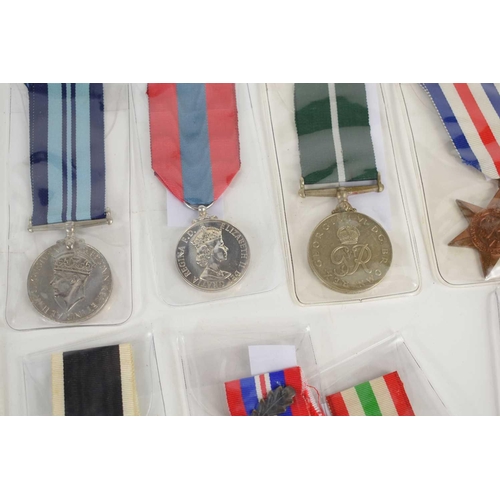 47 - A collection of WWII and later medals to include an Imperial Service Medal to Harry Carter, India Se... 