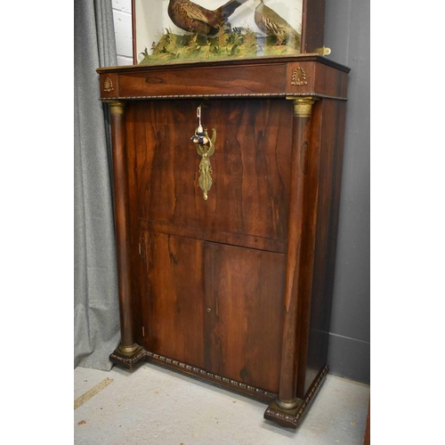 515 - A French Empire style secretaire with gilt metal mounts.