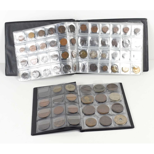 70 - Two albums of GB and worldwide coinage to include Chinese coins, silver coins, George III token, Que... 