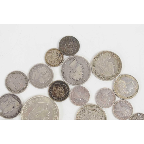 72 - A quantity of George IV and later silver coinage to include florins, sixpences and others.