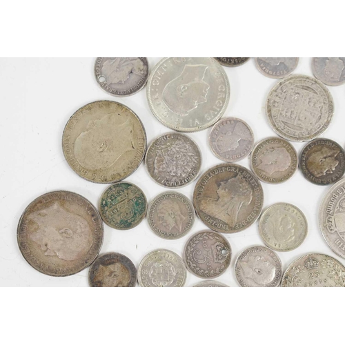 72 - A quantity of George IV and later silver coinage to include florins, sixpences and others.