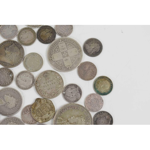 72 - A quantity of George IV and later silver coinage to include florins, sixpences and others.