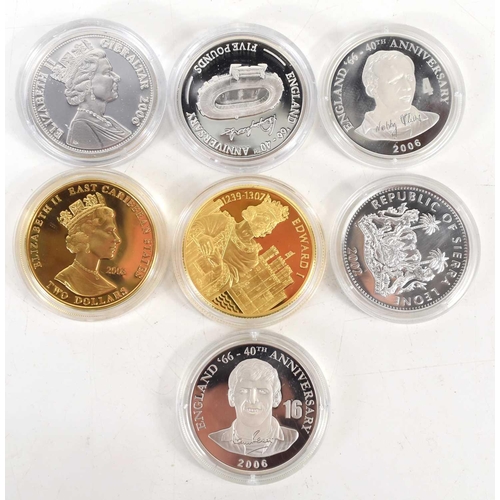 75 - Five silver commemorative coins to include four 40th Anniversary of England winning the World Cup si... 