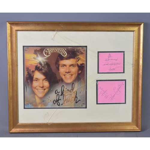 90 - The Carpenters, framed and mounted autographs, the first card signed 