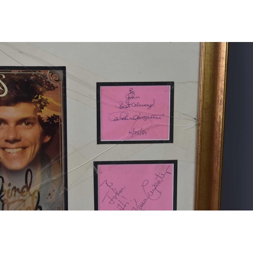 90 - The Carpenters, framed and mounted autographs, the first card signed 