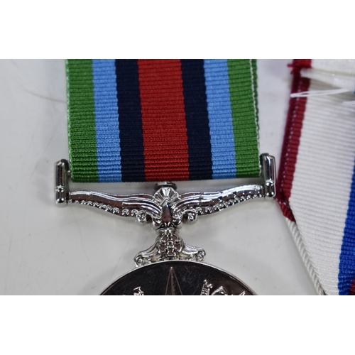 7 - A group of military medals to include a Liberation of Kuwait medal, Greek war cross, Operational Ser... 