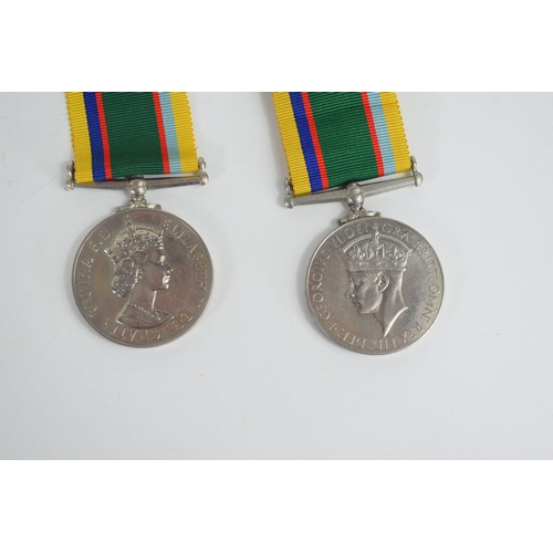 6 - Two Cadet Forces medals, one issued to Lt J.W McGuire, the other issued to Lieut F.Carson.