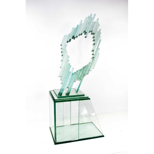 11 - Peter Newsome F.R.S.S., R. B. A, (British Contemporary): a glass sculpture with integral glass stand... 