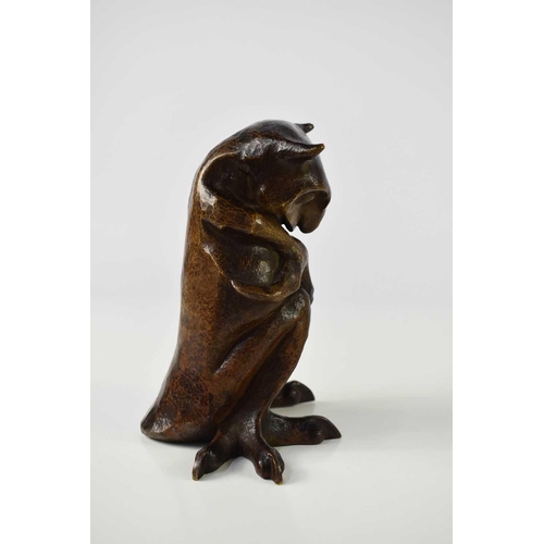 12 - Leopold Chauveau (French, 1870-1940): a martele bronze Monstre sculpture, being a seated figure of a... 