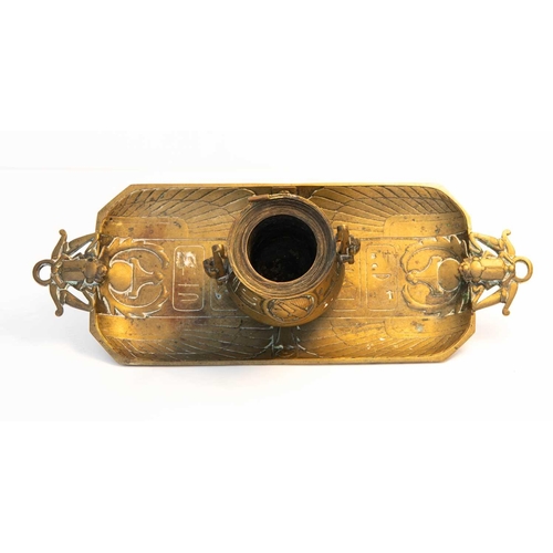 25 - An Egyptian Revival brass inkstand, the cover having a finial modelled as Baphomet / Mendes, above t... 