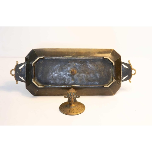 25 - An Egyptian Revival brass inkstand, the cover having a finial modelled as Baphomet / Mendes, above t... 