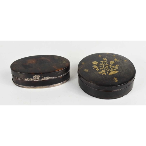 338 - Two 19th century, likely French, snuff or powder boxes, comprising an ebony box and cover, of circul... 