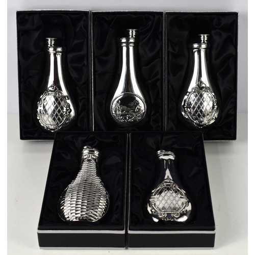 343 - A group of five James Dixon & Sons large Cornish pewter flasks, in various styles to include basket ... 