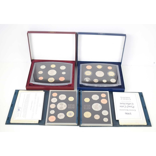 358 - A group of four Royal Mint proof coin sets for 1996, 1997, 2001 and 2002.