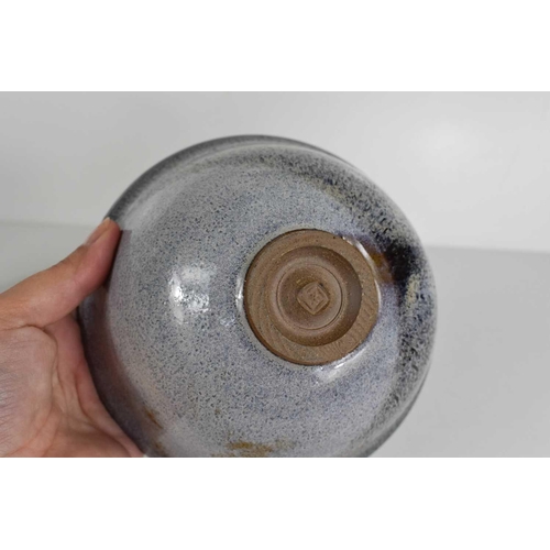 65 - A group of Studio pottery to include a stem vase, bearing mark G? with bordering dots, a bowl with m... 