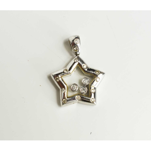 A Chopard 18ct white gold floating diamond star pendant with