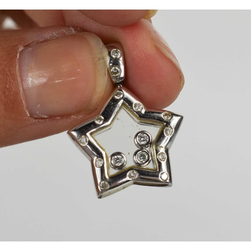 A Chopard 18ct white gold floating diamond star pendant with