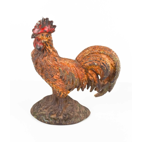 106 - An American antique door stop in the form of cockerel, with original residual paintwork, 22cm high.