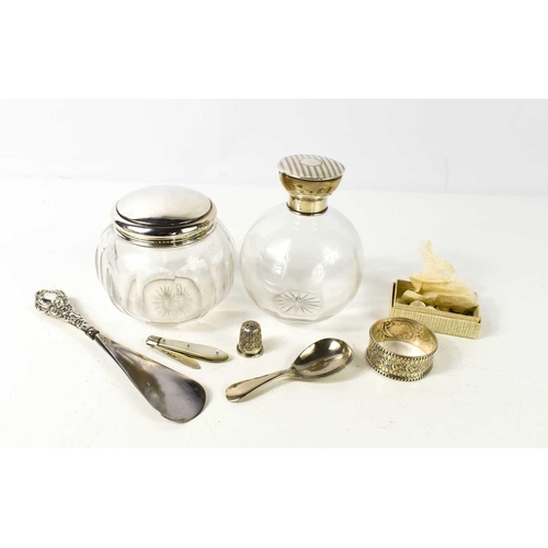 119 - Two silver and glass dressing table bottles; one London 1919, the other Birmingham 1923, together wi... 