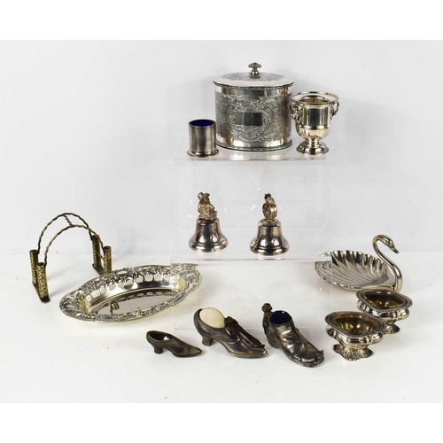 120 - A pair of silver and clear glass liners, 2.73g, two shoe form pin cushions, two Falstaff silver plat... 