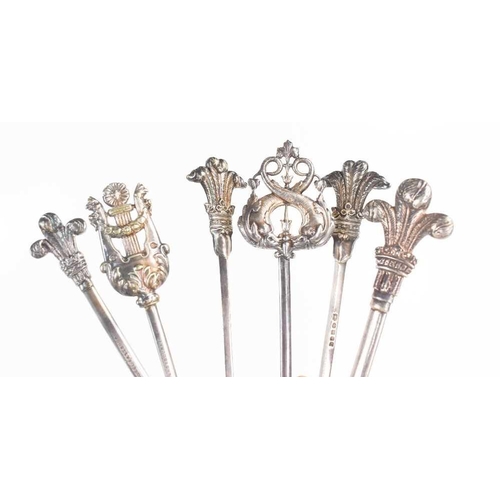 125 - A group of six silver plated meat skewers of various design, from the Grand Hotel in Eastbourne.