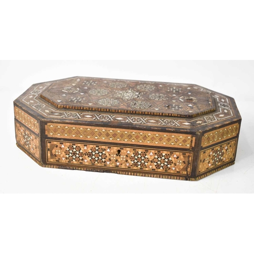 140 - A Syrian micromosaic box, inlaid with mother of pearl and various specimen woods, of rectangular for... 