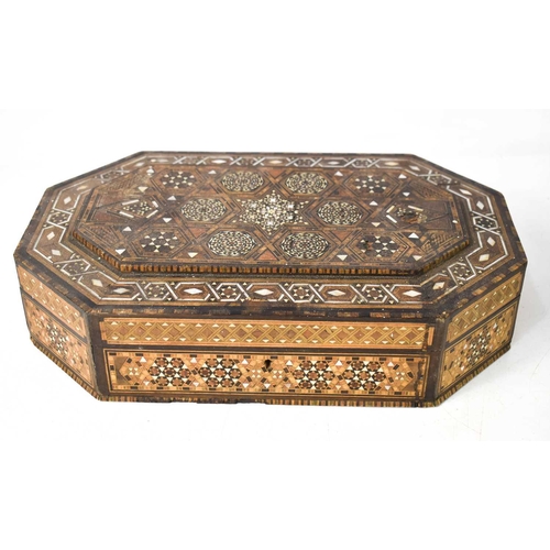 140 - A Syrian micromosaic box, inlaid with mother of pearl and various specimen woods, of rectangular for... 