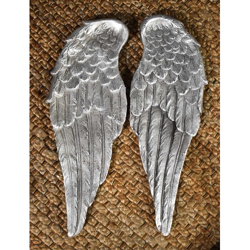 150 - A pair of silvered plaster angel wings.