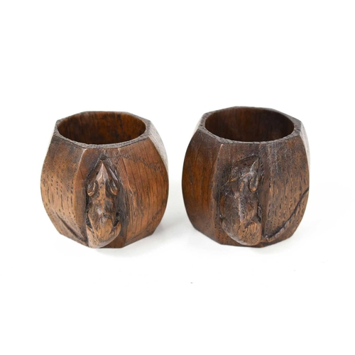 160 - A pair of Robert Thompson 'Mouseman' napkin rings, both bearing the carved mouse trademark.