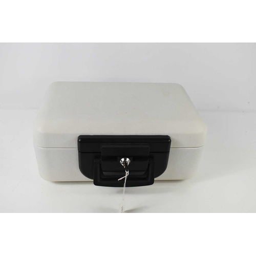 168 - A cream coloured lockable strong box carry case, with key, 37 by 16 by 29cm high including catch.