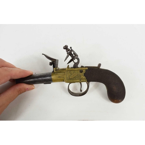 18 - A late 18th century flintlock boxlock pocket pistol by H. Nock of London, with rounded saw grip havi... 