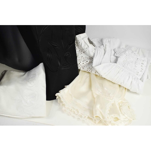 180 - A collection of Victorian and Edwardian underwear, including a chemise, nightgowns and bloomers toge... 