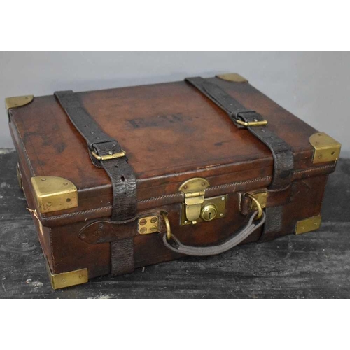 19 - An early 20th century leather cartridge case, with a fitted interior, by John Blanch & Son Gunmakers... 