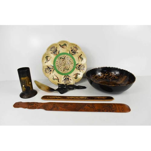 198 - A group of collectables to include Chinese brush pot, horn spoon, page turners, and a black laquered... 