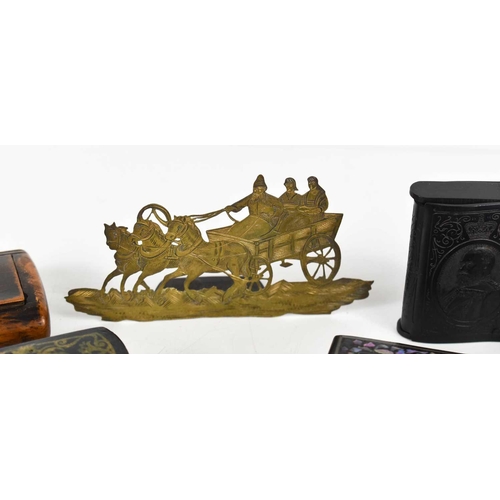 201 - A Russian brass engraved plaque depicting horses and carriage, together with a group of antique blac... 