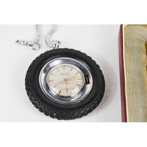 208 - A Sarcar Geneve pocket watch in the form of a tyre, the dial swivels around to reveal the visible wo... 