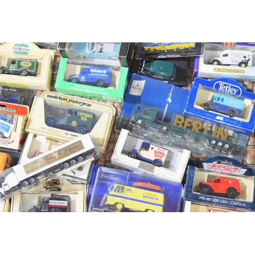 266 - A large quantity of boxed and loose diecast vehicles to include examples by Lledo, Corgi, Matchbox a... 