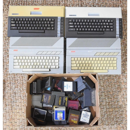285 - Two vintage Atari 800XL computers together with two Atari 65XE computers and a small group of Atari ... 