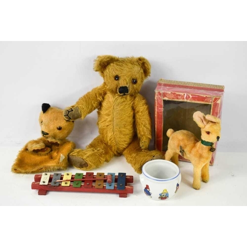 289 - A vintage Merrythought bear, circa 1950, with embroidered label to the foot, 30cm long, together wit... 