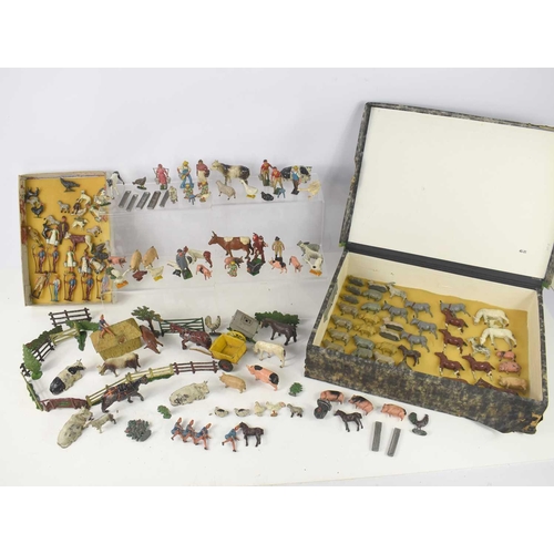 294 - A large collection of painted lead and diecast farmyard animals and figures, to include examples by ... 