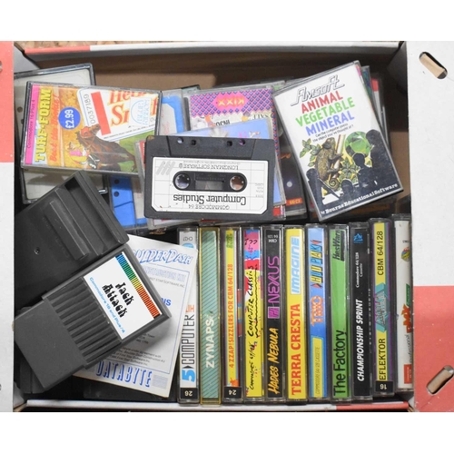 297 - A large group of vintage Commodore 64/128 games to include Nemesis The Warlock, Rolling Thunder, Sol... 