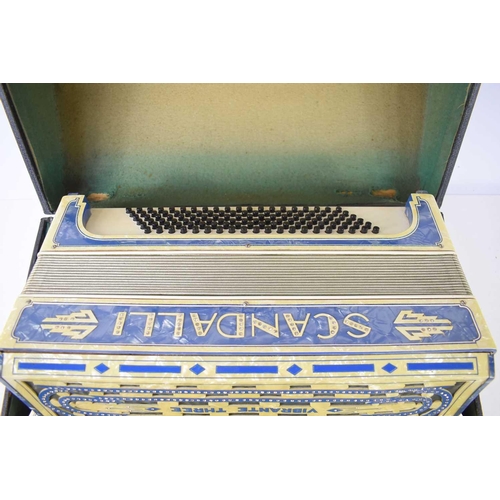 329 - A Scandalli Vibrante Three accordion with faux ivory keys in the original case.