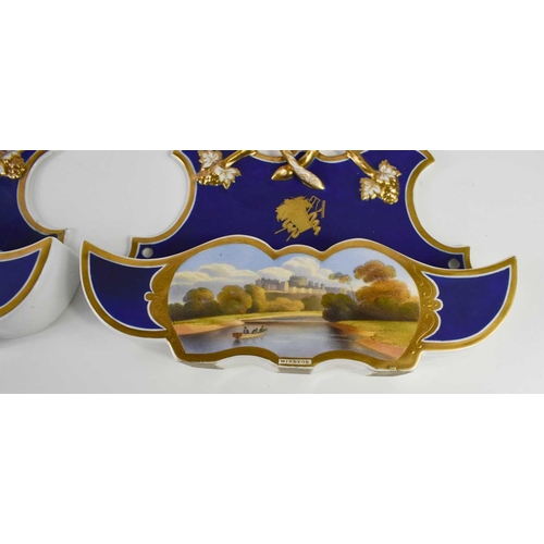 347 - A pair of Chamberlain Worcester wall pockets, painted with titled views of Windsor & Malvern, with c... 